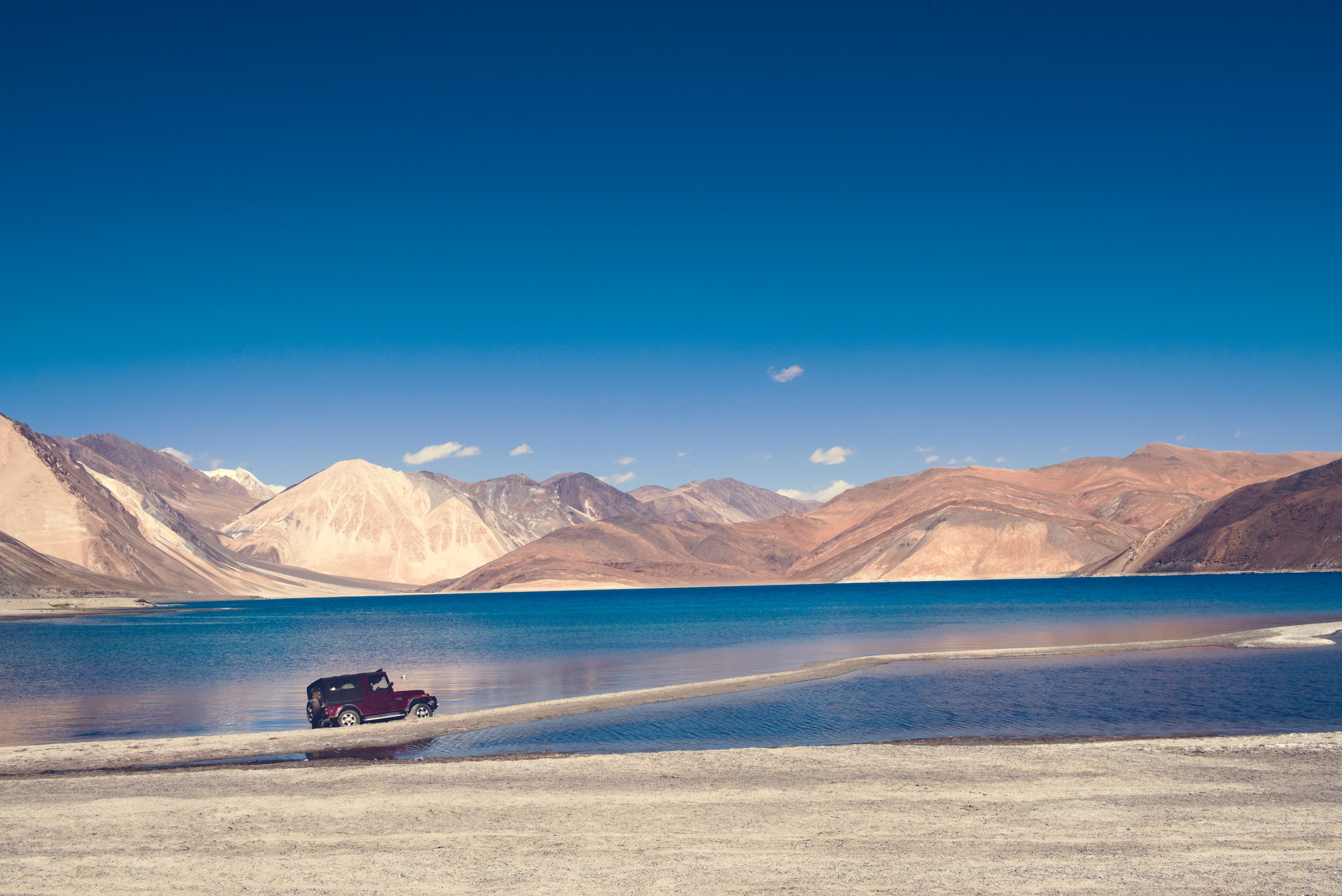 Turquoise lake surrounded by mountains near Skardu